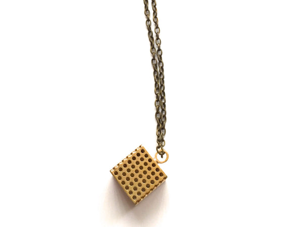 3d printed cube pendant in brass